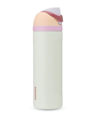 Owala FreeSip 24 oz stainless steel water bottle in Coastal Mist, with its push-button flip lid and carry loop